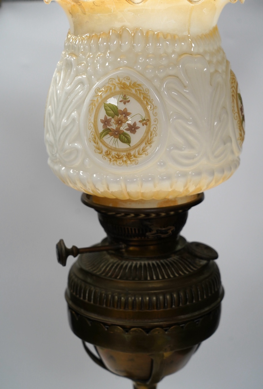 A Victorian brass ‘sphinx’ oil lamp with glass shade. Condition - fair to good